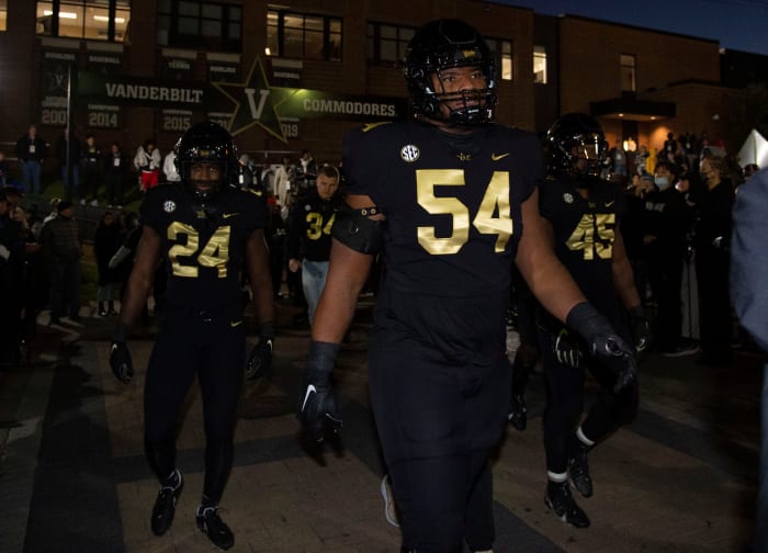 Vanderbilt offensive lineman Tyler Steen (54) and teammates take the "Star Walk" before the game against Kentucky at Vanderbilt Stadium Saturday, Nov. 13, 2021 in Nashville, Tenn.